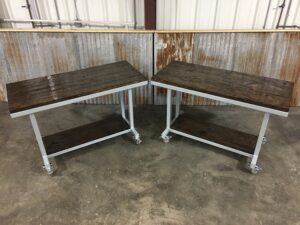Two completed worktables placed side by side