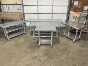Some worktables from the Galvanized series on display