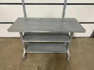 Two shelves provided in this Galvanized Series Worktable
