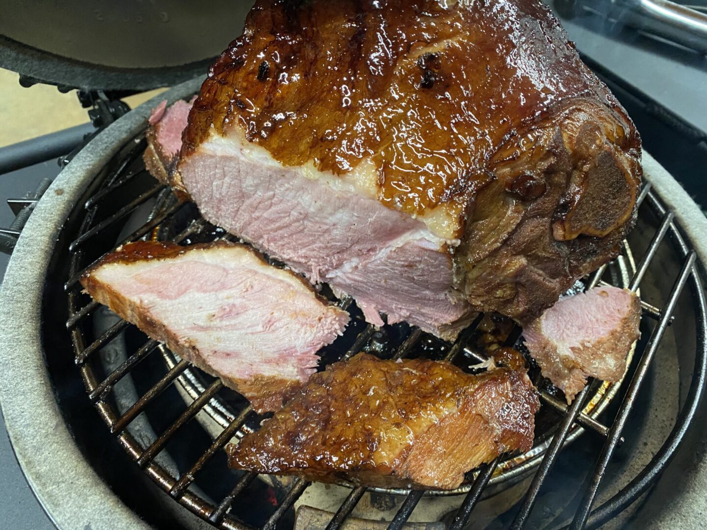 Ham in process of being grilled on one of the tables