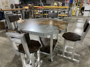 Stools with backrest provided along with the worktable