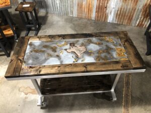 Glazed finish of the Distressed Metal Inlay Worktable
