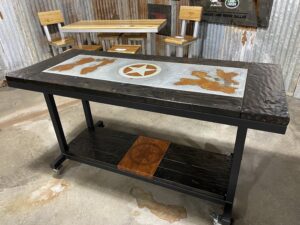 Front view of the Distressed Metal Inlay Worktable