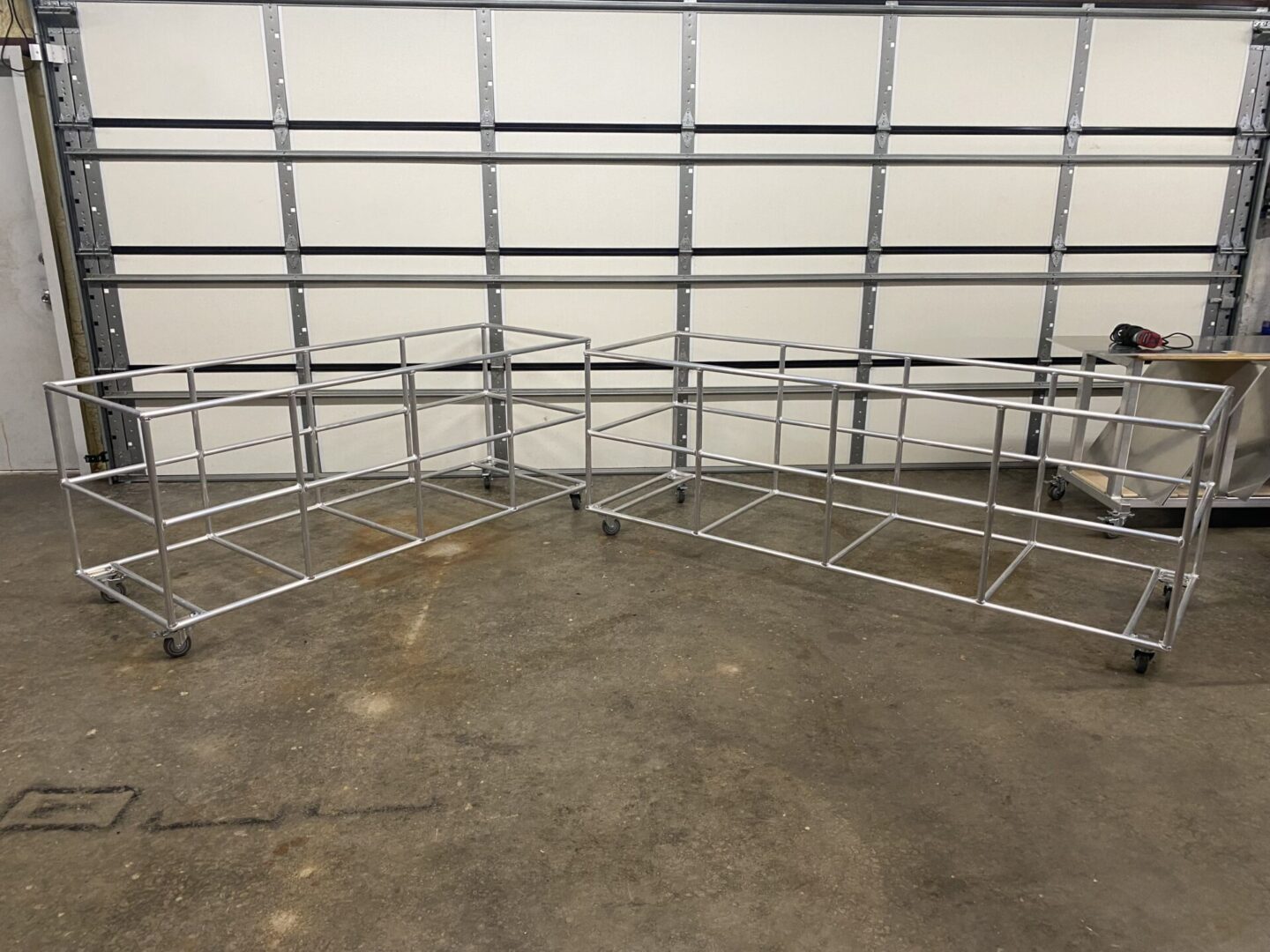 Two Custom Mobile Cage Carts by Hawthorne Tables
